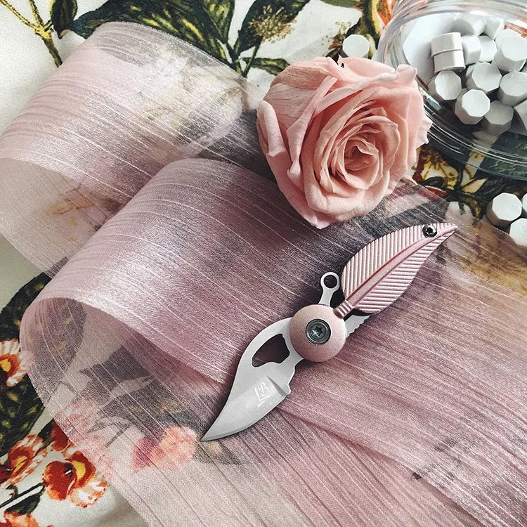 New Multi-functional Folding Creative Feather Knife Fruit Knife Keychain Daily Carry Tool